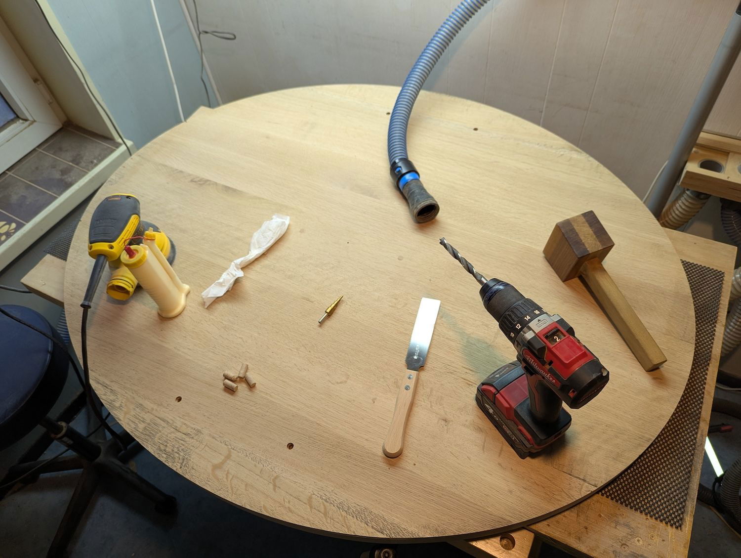 The bottom had some holes that were used for the previous base. I drilled them slightly larger and filled them with some matching oak plugs i made.