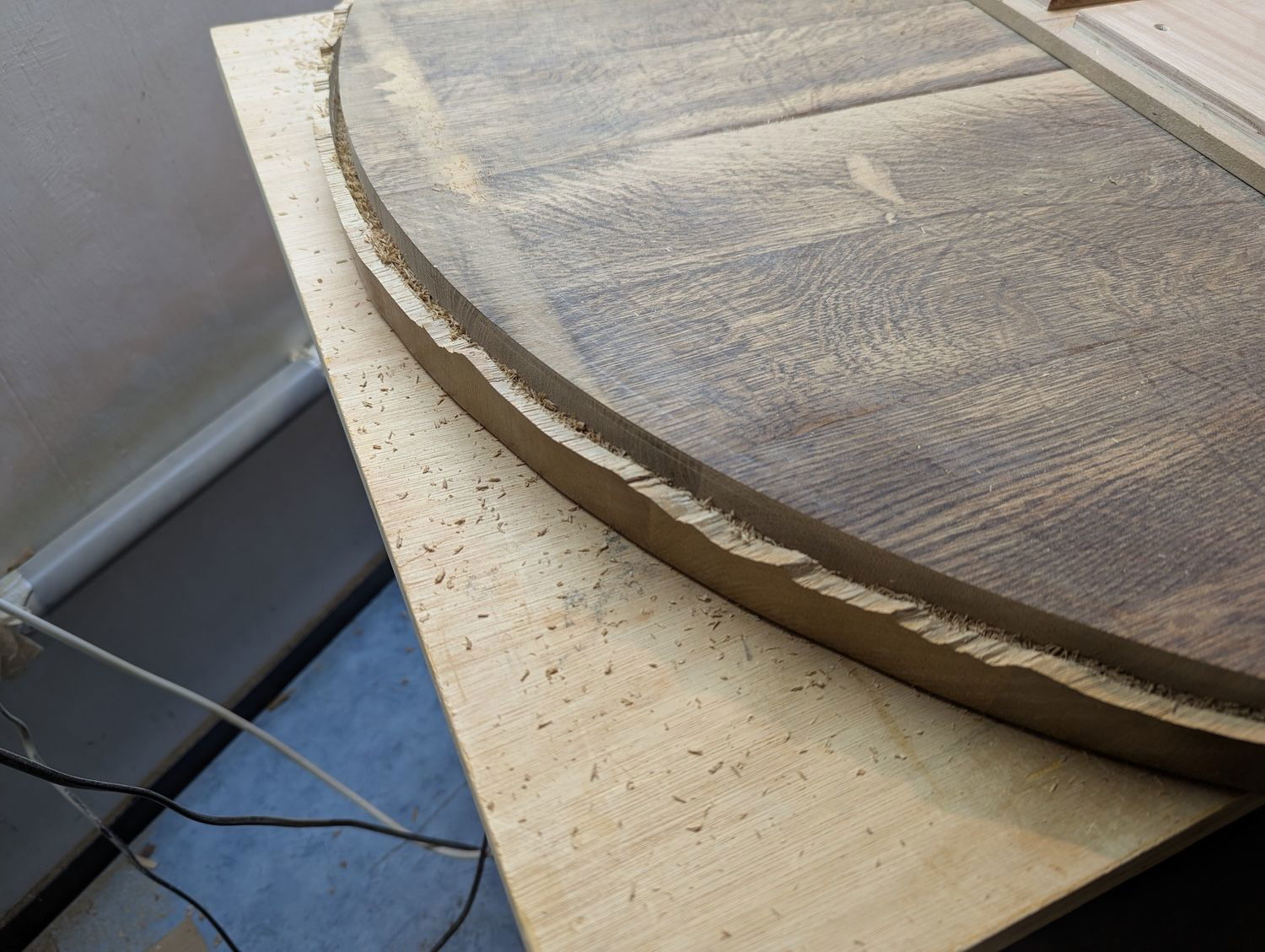 I broke some of the edge away to give the router bit some space when doing the deeper passes