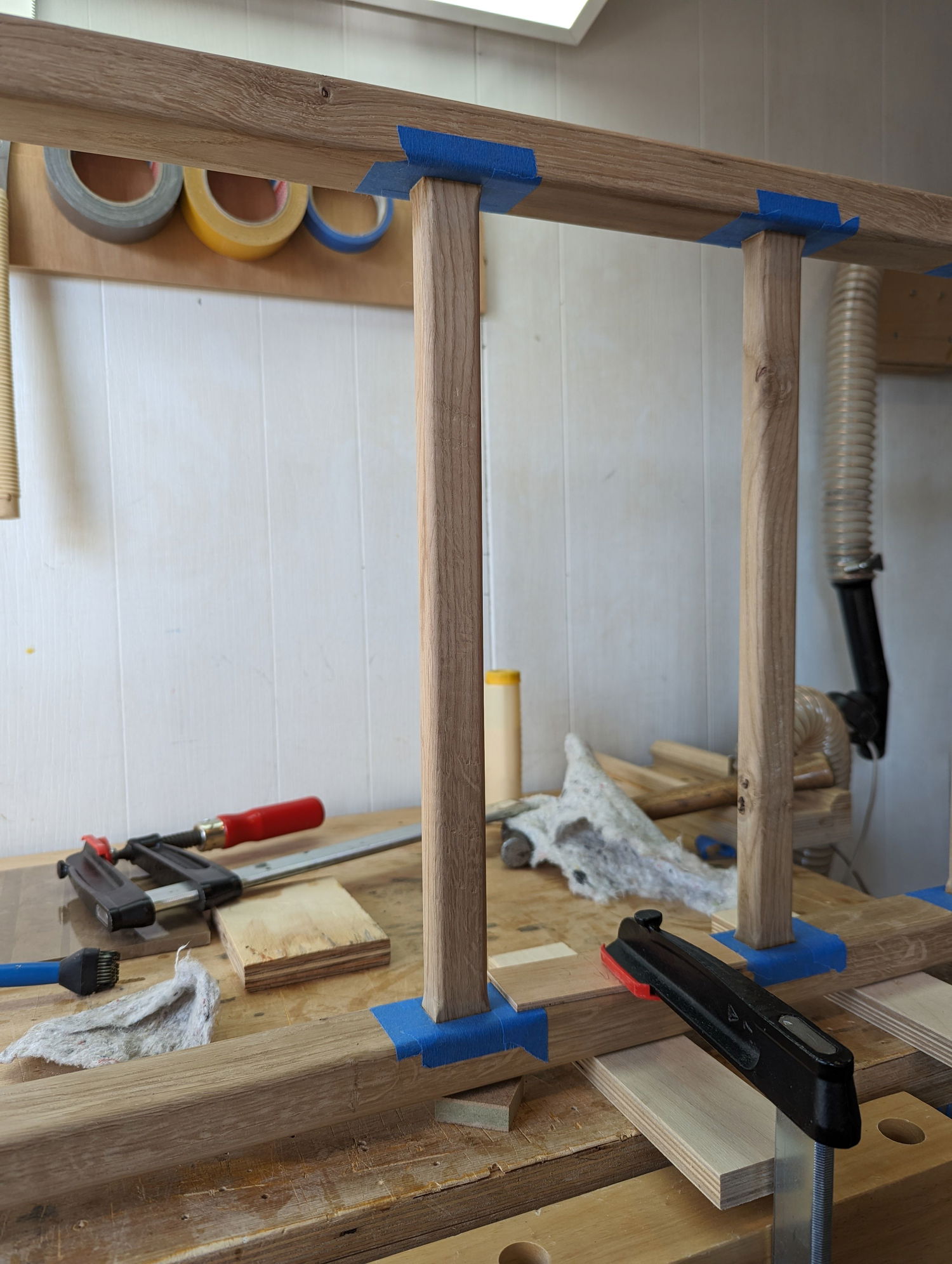 Glue up of the sides. Added tape to make the cleanup of glue squeeze out easier.