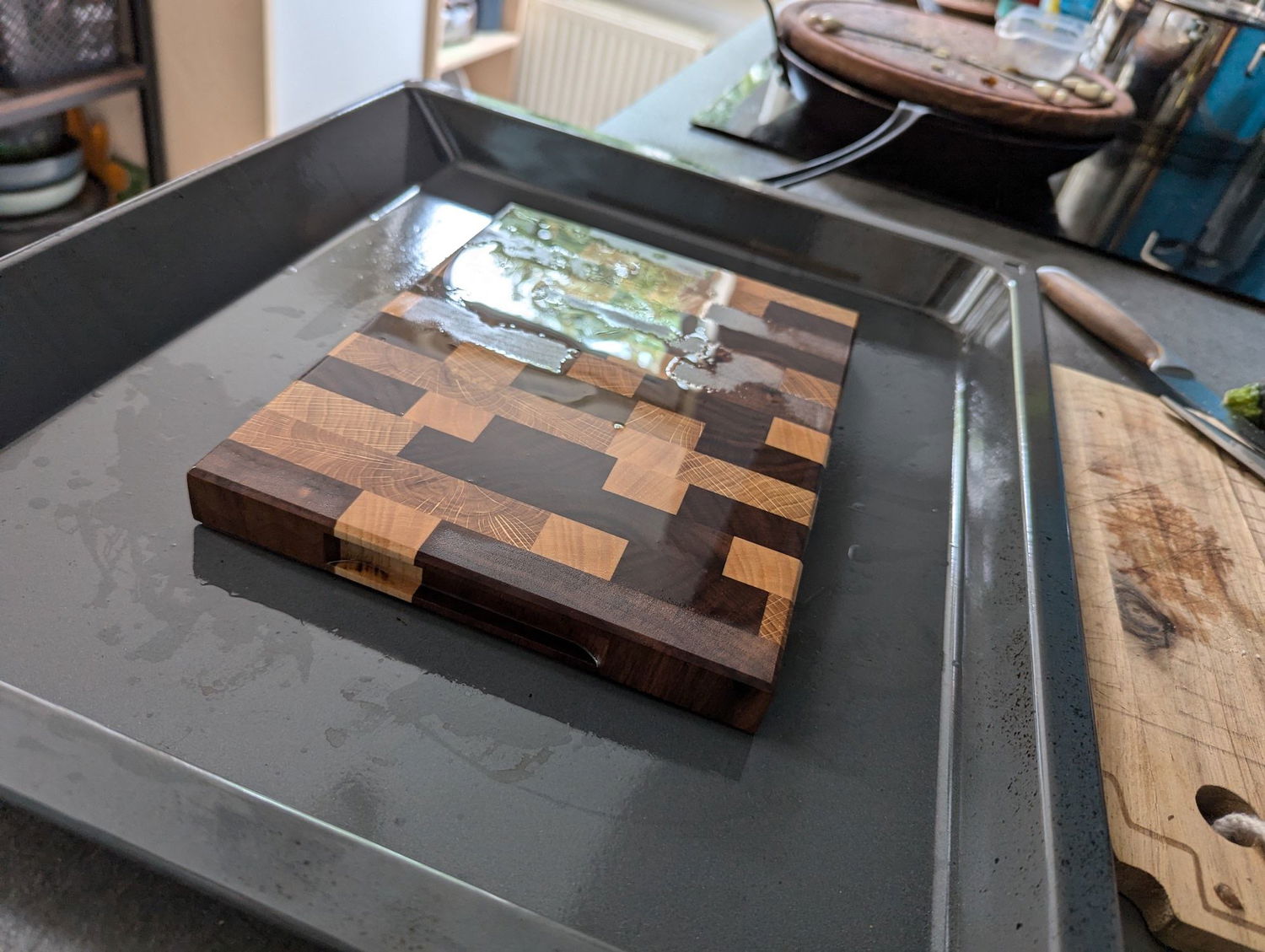 Used a bottle of cutting board oil to soak it. The walnut was extremely thirsty so i just let it soak for a bit and kept adding oil until it was pretty much saturated.