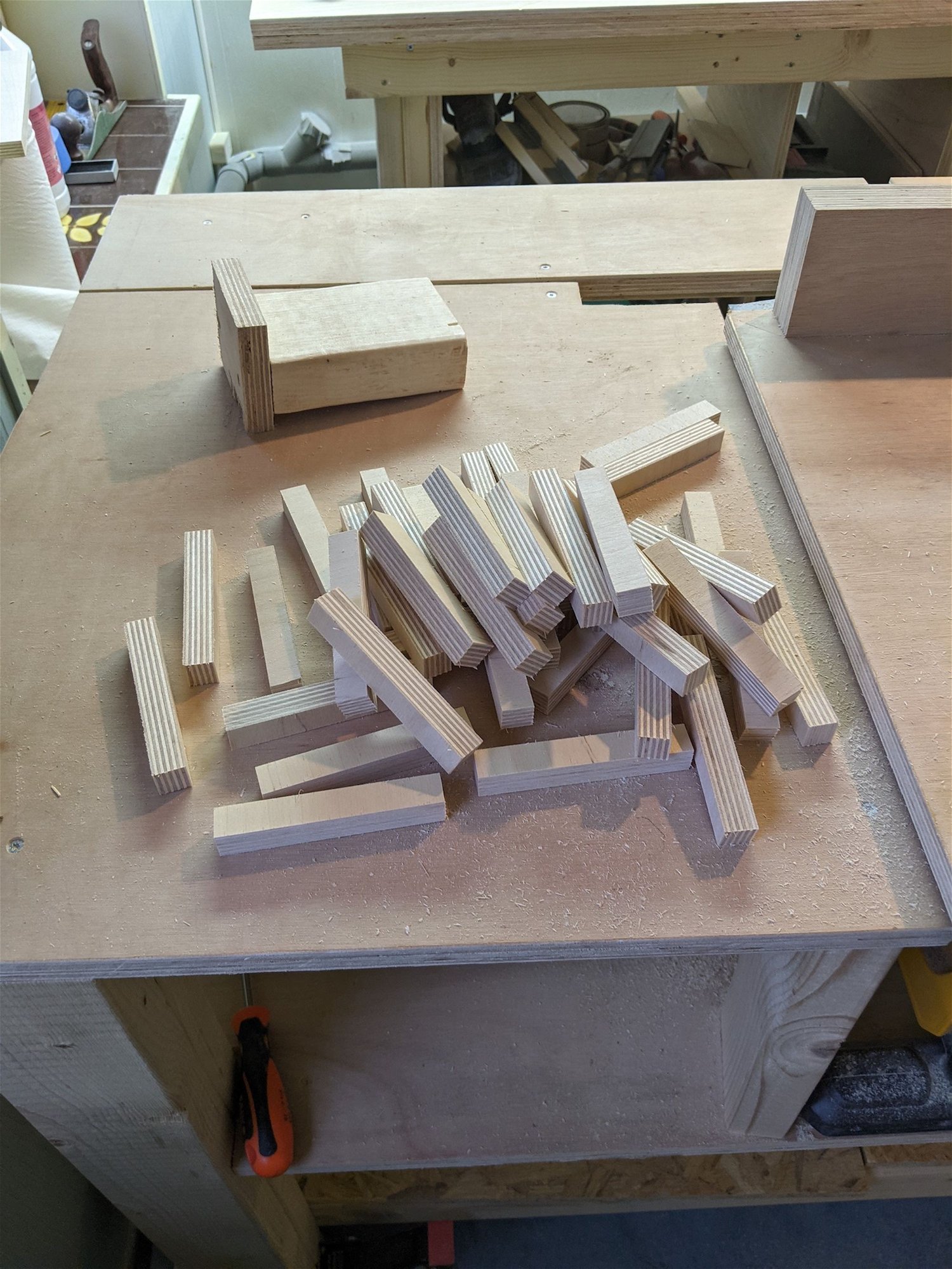 Here is started on the panels for the doors. I've been inspired by a lot of patterned plywood works and i love geometric designs and shapes so i decided to go ahead and create 2 doors to fit the dresser. Here i've cut pieces of plywood to ±10cm strips with a width of around 16mm which would match the thickness of the plywood(after sanding).