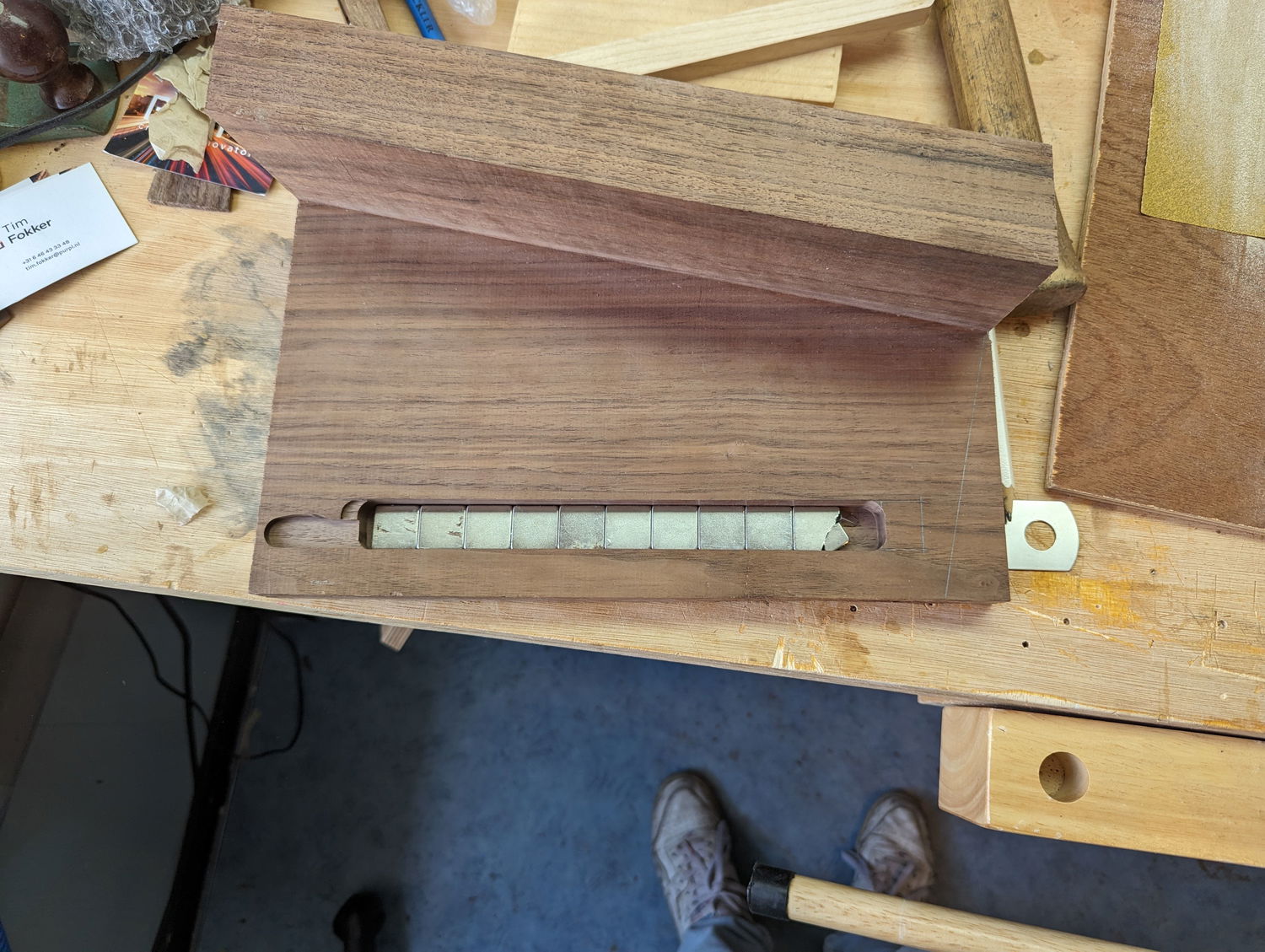 Routed out a recess for the magnets that will be holding the knives. As you can see on the left hand side i made a mistake with setting the guides for the router as one piece moved and the router bit into it. Luckily i avoided it breaking the side of the panel as this is just the back piece. And yes, that’s a broken magnet ont he right. These magnets were particularly strong!