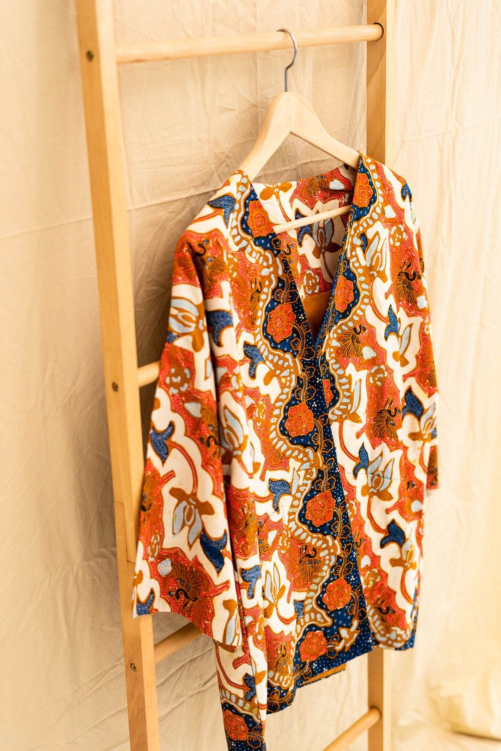 A jacket made from hand-drawn batik
Context