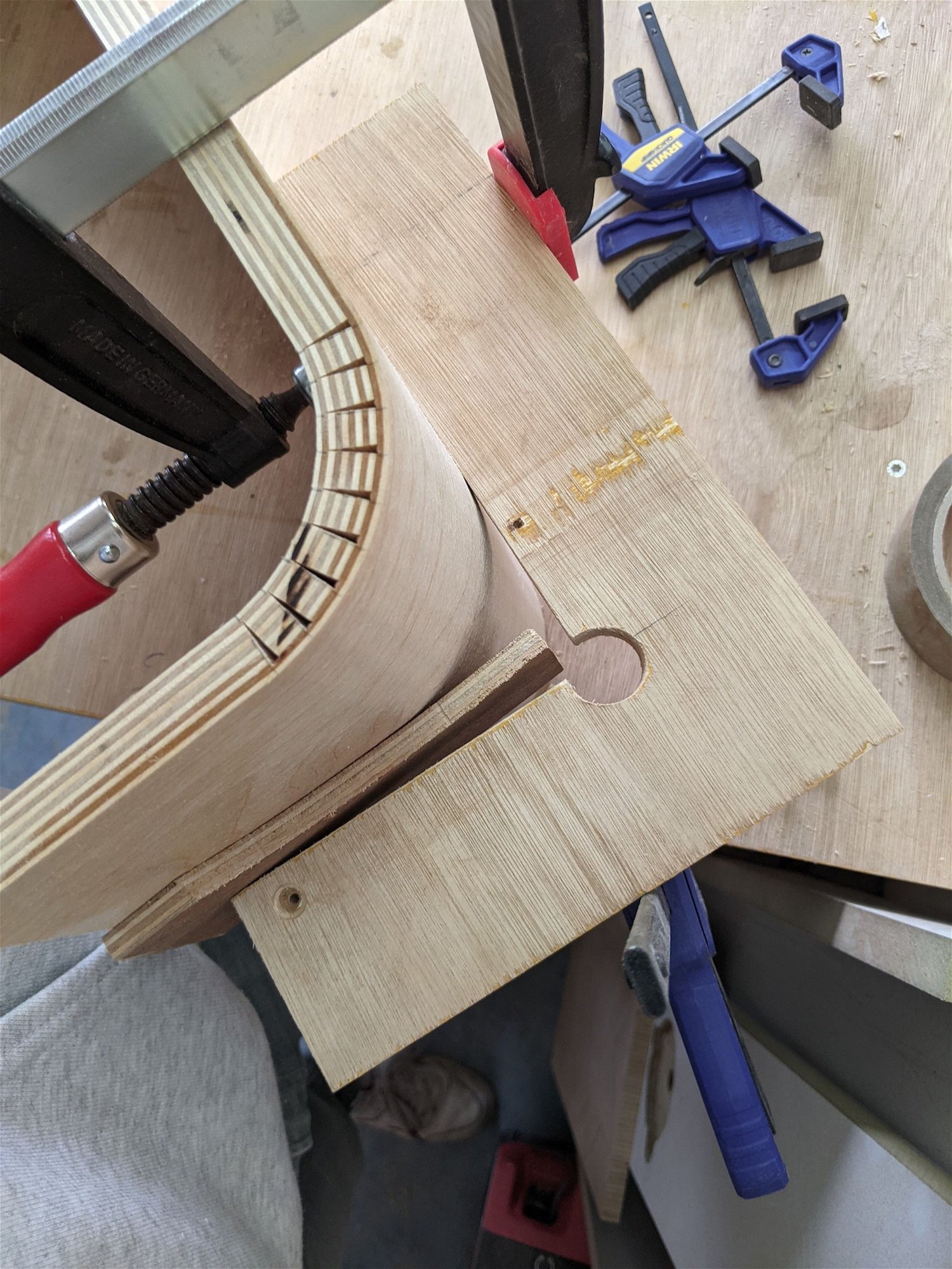 I made some simple jigs to clamp the wood. It's not exactly 90 degrees; that was intended.