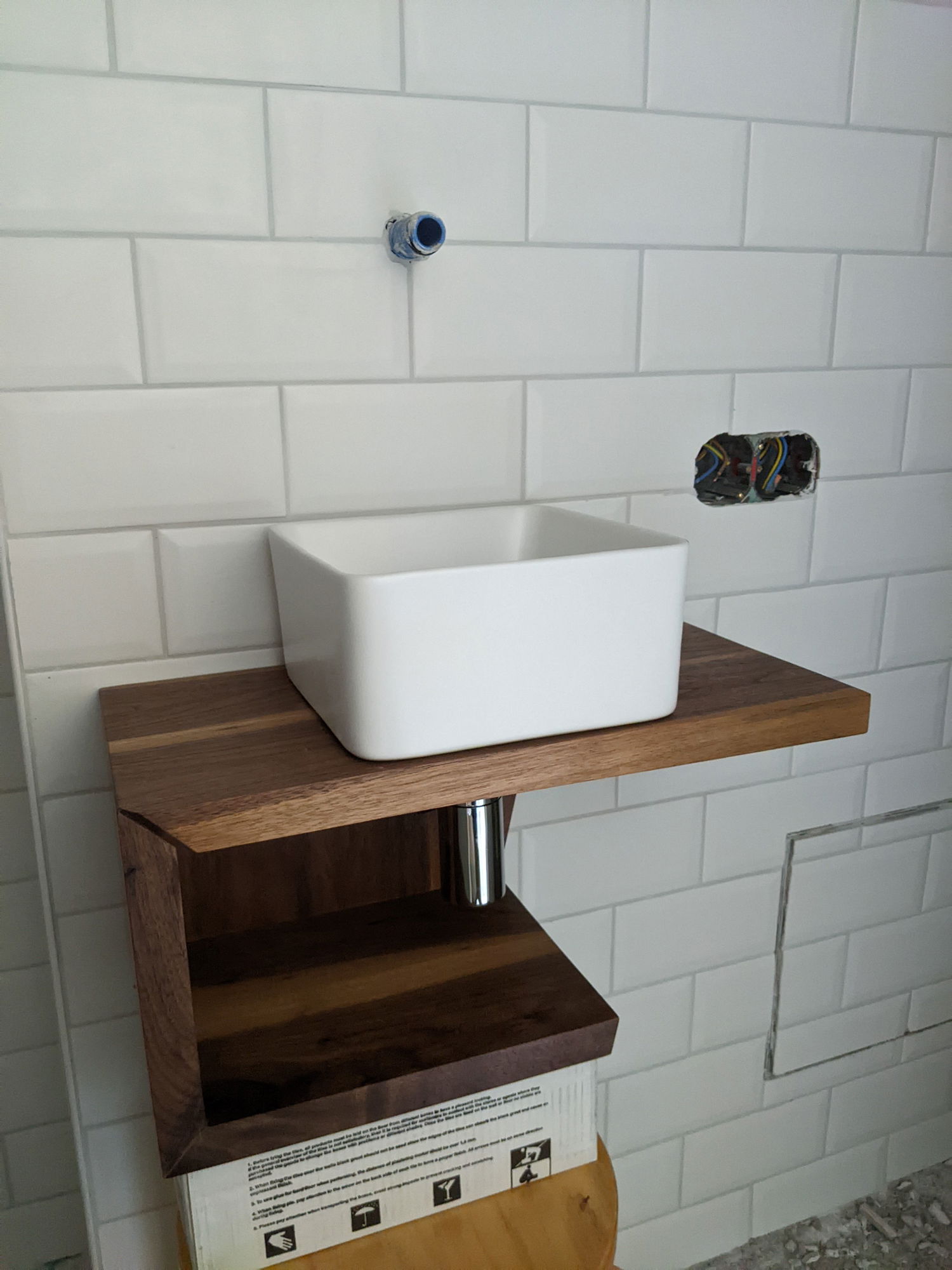 Test fit for height in the bathroom before finishing the renovation.